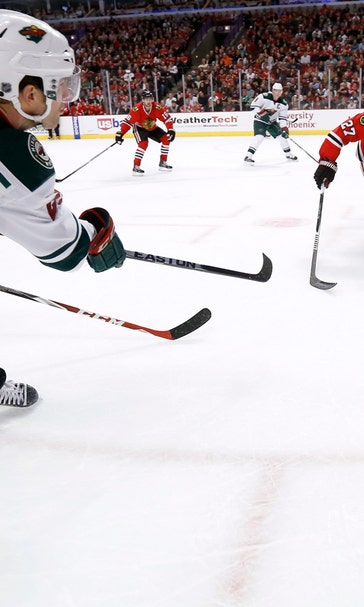 Blackhawks fend off Wild, 5-3